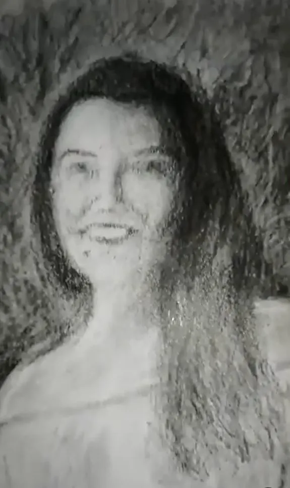 Sourire au fusain